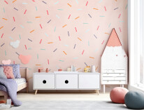Mockup of a TV in a kids' room with a white background on a wall.