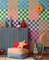 Stylish playroom with orange wall, decorative bunting, plush sea