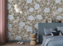 Cozy bedroom with a stylish headboard, muted blue bedding, and a